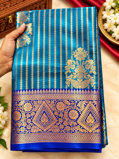 All-over gold-toned zari motifs with vertical dotted patterns and floral buttas